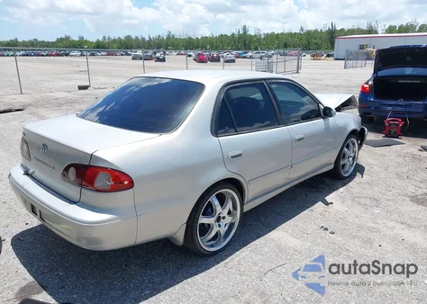 2001 Toyota Corolla S z USA, uszkodzony, nr VIN 2T1BR12E51C494473